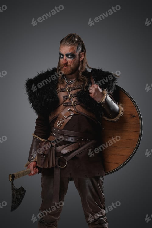 Preview: Bearded scandinavian barbarian with shield and axe from past