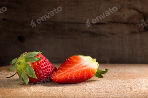 Preview: ripe strawberries on wood table