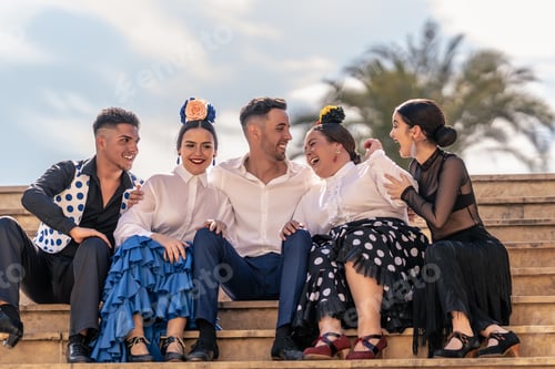Preview: Two flamenco apprentices laugh out loud with their teacher and two other classmates