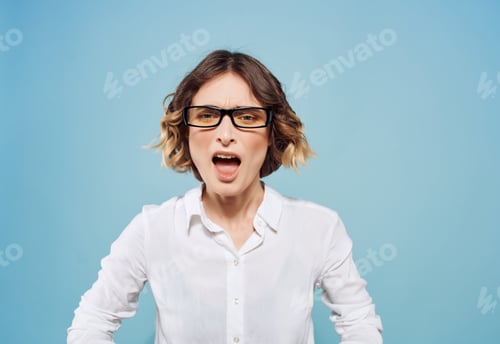 Preview: Business woman in white shirt and glasses working office blue background