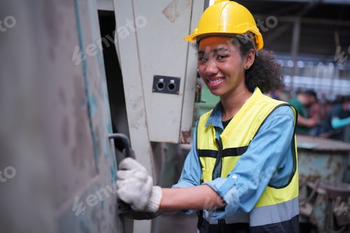 Preview: Factory Engineer Operating machines in industry factory.
