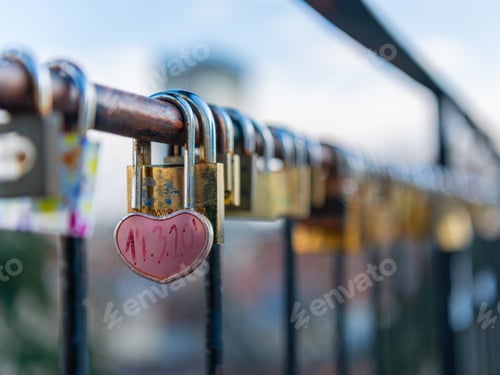 Preview: Heart-shaped padlock locked on the fence