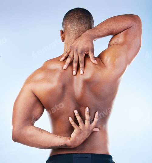Preview: Back, strong and black man with muscle touching his spine as self love, skincare and isolated in a