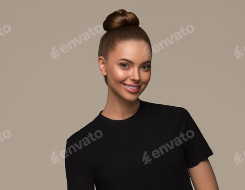 Preview: Smiling Woman with Stylish Hair Bun Posing