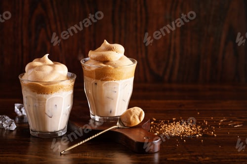 Preview: dalgona coffee in glass. trendy Instant coffee whipped with sugar and hot water