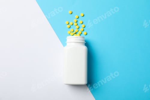Preview: Medical container and pills on two tone background, space for text