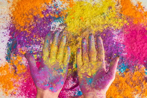 Preview: cropped view of woman with hands in multicolored holi powder