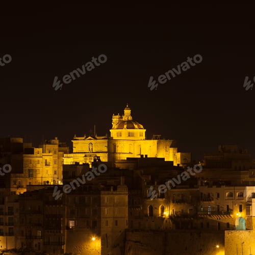 Preview: St Philip's Church over city at night, Senglea, Malta