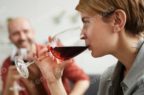 Preview: Woman drinking wine