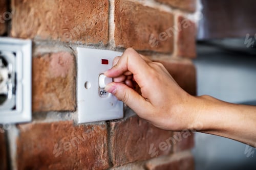 Preview: Closeup of switch on brick wall