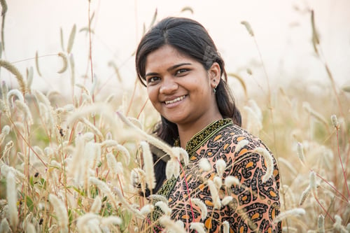 Preview: Smiling woman farmer in agricultural field