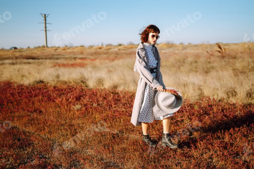 Preview: Young woman resting in nature. People, lifestyle, relaxation and vacations concept.style concept.