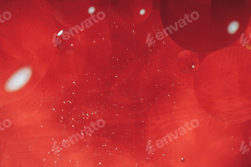 Preview: Bubbles close-up in the water against red background