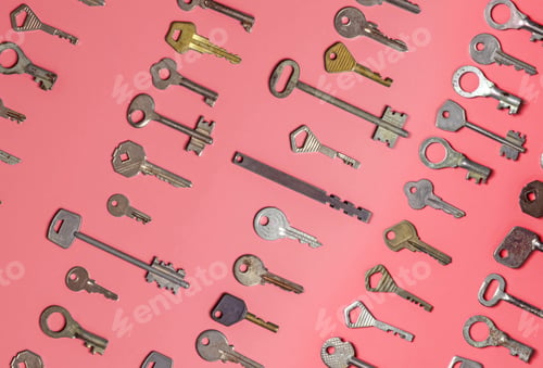 Preview: Keys set on pink background. Door lock keys and safes for proper