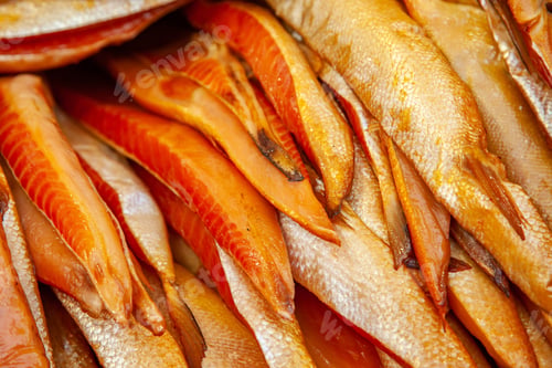 Preview: Far Eastern seafood, natural smoked fish - bellies of Chinook salmon at the city market
