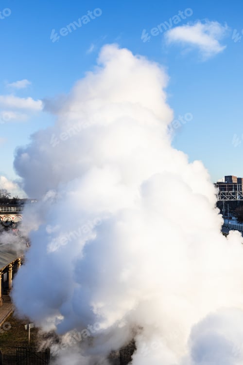 Preview: steam from locomotive chimney on sunny day
