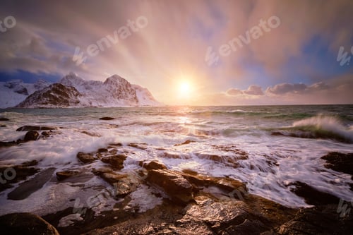 Preview: Coast of Norwegian sea on rocky coast in fjord on sunset
