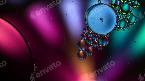 Preview: Abstract Colorful Food Oil Drops Bubbles and spheres Flowing on Water Surface