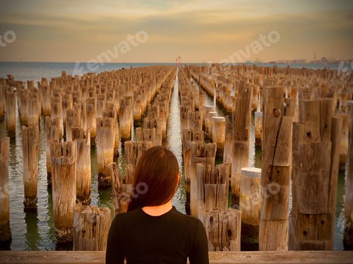 Preview: Woman sitting at the ferry terminal