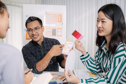Preview: A group of UX/UI designers brainstorming creative ideas together