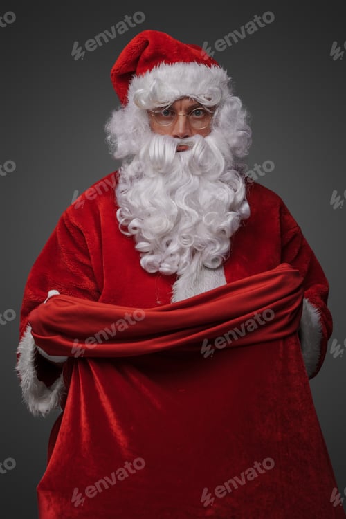 Preview: Santa claus with bag stuffed with christmas presents