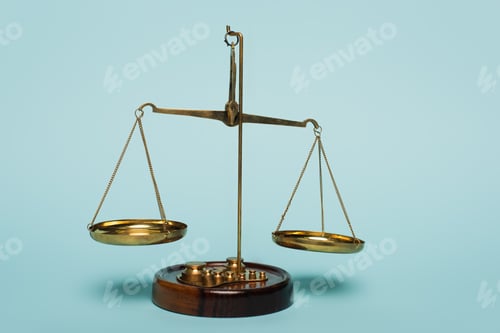 Preview: bronze justice scales on blue background, anti-corruption concept