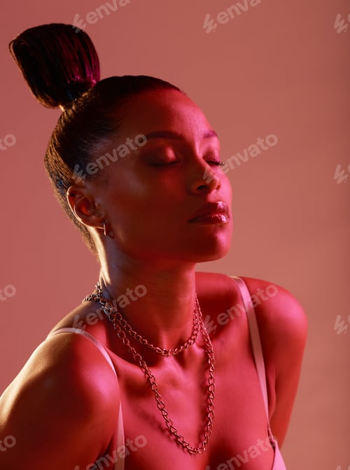 Preview: Beauty aesthetic, cosmetics and face of woman in neon studio with makeup, designer jewellery and st