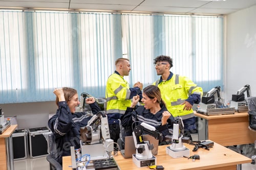 Preview: Engineer celebrate success examination passed on maintenance and programing robot in training room