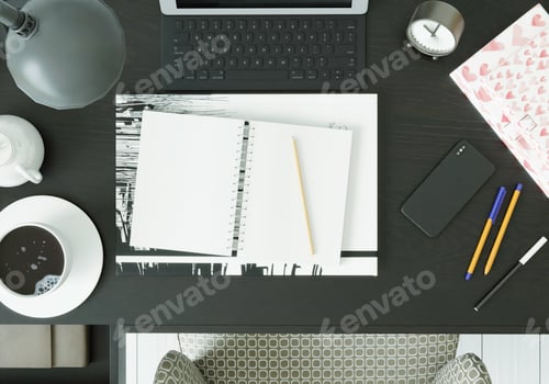Preview: A working room with tablets, books, pens and smartphones on the table.
