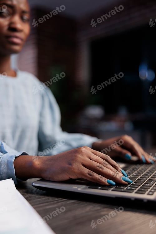 Preview: Close up shot of african american forex stock professional trader at desk