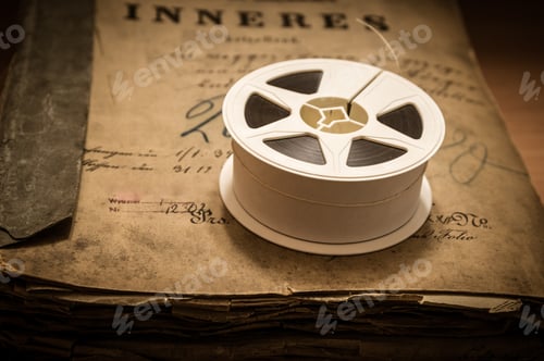 Preview: Closeup shot of microfilm and aged archives