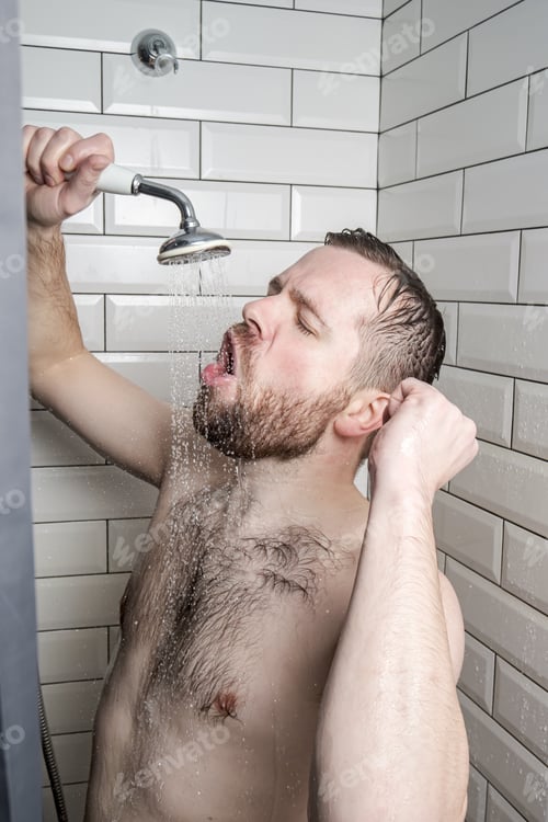 Preview: Funny man enthusiastically sings in bathroom, using shower with running water instead of microphone