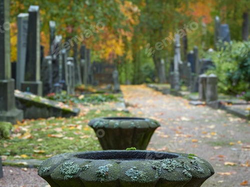 Preview: On the alleys of the park in European cemetery.