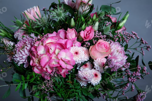 Preview: Bouquet of fresh flowers in pale pink tones on a gray background
