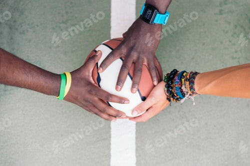 Preview: Multiethnic Friends Stacking Hands.