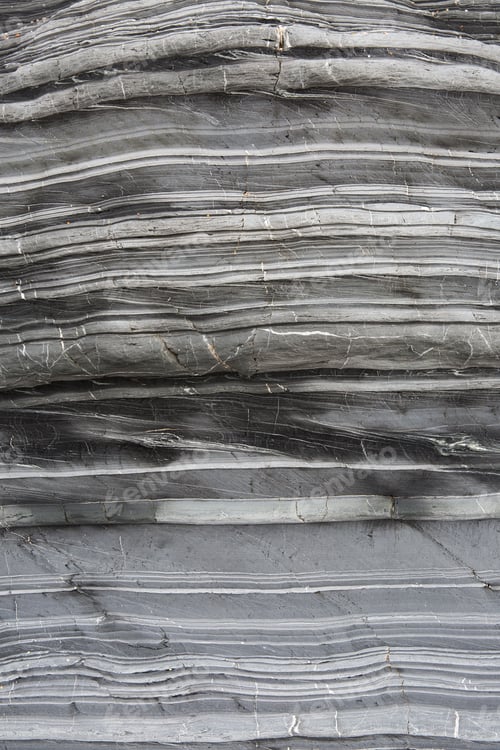 Preview: A background image of the layers in a geological rock formation of slate and marble with copy space
