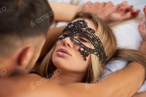 Preview: Girl in bed, lace mask