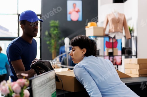 Preview: Worker analyzing logistics report