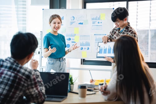 Preview: Successful business people present analytics reports while working with colleagues in the modern off