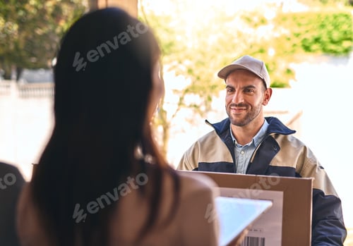 Preview: Deliveries done with speed. Shot of a courier making a delivery to a customer.