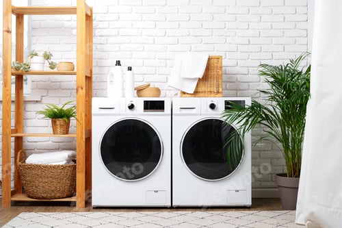 Preview: Modern Laundry Room With White Appliances and Green Plants