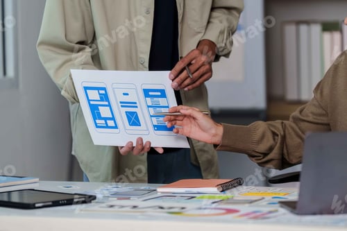 Preview: Creative Team Reviewing App Design Prototypes