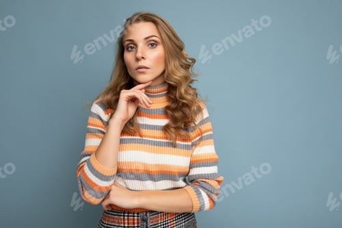 Preview: Portrait photo of young pretty beautiful attractive serious thinking thoughtful blonde woman with
