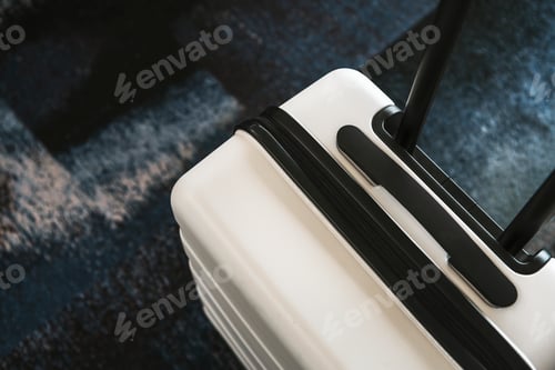 Preview: White luggage at the airport