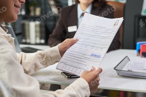 Preview: Young Adult Woman Holding Approved Visa Application Form at Visa Center Desk