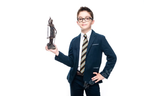 Preview: schoolboy in costume of lawyer posing with themis statue isolated on white