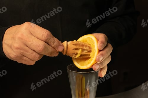 Preview: Squeezing fresh orange for juice