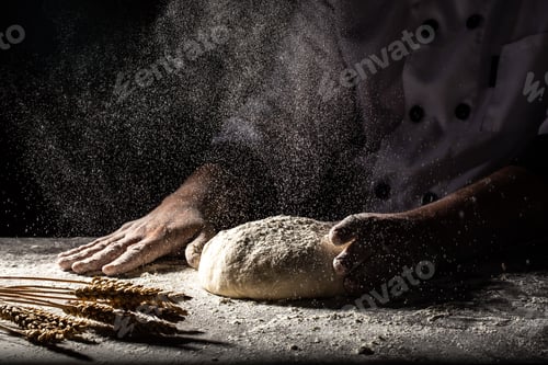 Preview: White flour flying into air as pastry chef in white suit slams ball dough