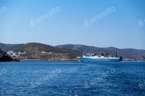 Preview: Ferryboat in blue Aegean sea and sky background. Greek island. Greece