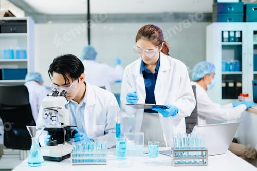 Preview: Scientists collaborating in a modern lab with microscopes and blue liquids, representing